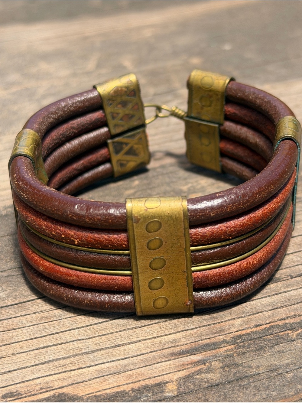 Hand-Tooled Black Leather Bracelet with Aged Brass Accents